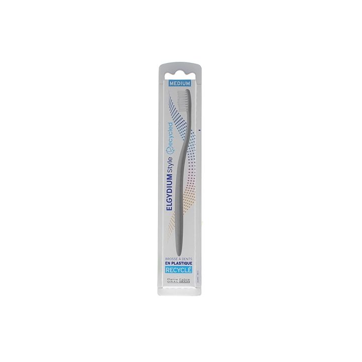 Brosse à dents en plastique recyclé médium Elgydium - une brosse à dents
